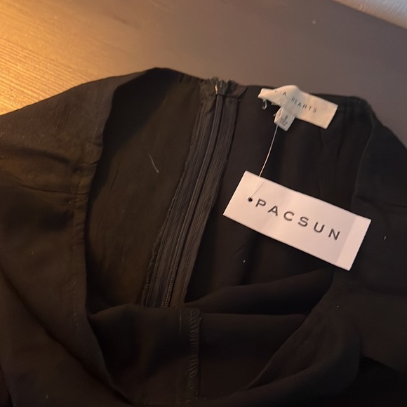 Short black cotton skirt with thin built-in shorts - Picture 3 of 4